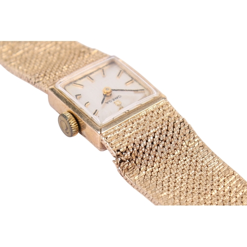 197 - A 9ct gold lady's Omega wristwatch. Gilt markers to the square champagne face, hallmarks to the clas... 