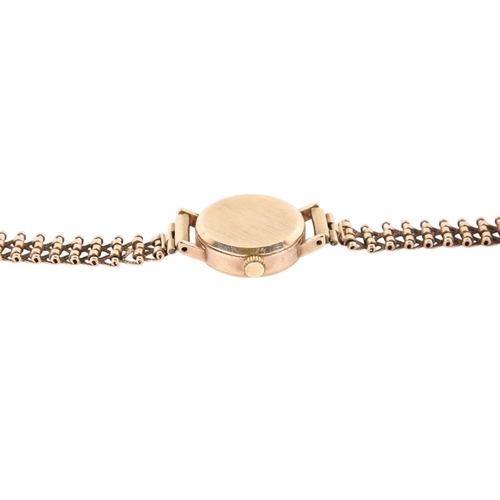 198 - A 9ct gold Rotary lady's quartz dress wristwatch. With gilt markers to the champagne face, hallmarke... 