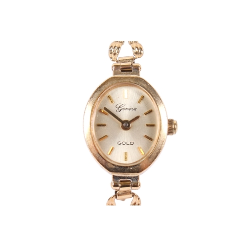 199 - A 9ct gold lady's Geneve Gold quartz dress watch. Gilt markers to the champagne face, hallmarks to s... 