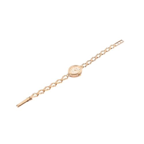 199 - A 9ct gold lady's Geneve Gold quartz dress watch. Gilt markers to the champagne face, hallmarks to s... 