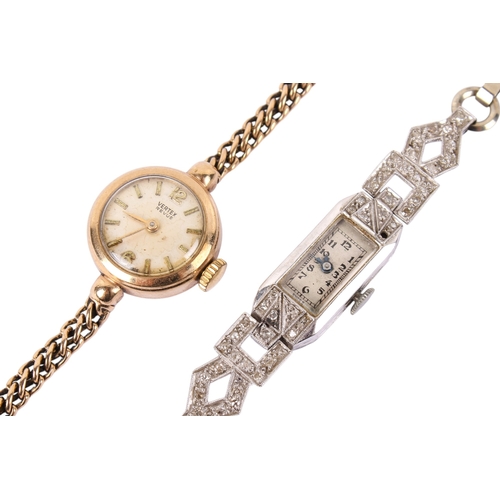 201 - A vintage 9ct gold lady's dress watch and a white metal example. The first Vertex Revue, with gilt m... 