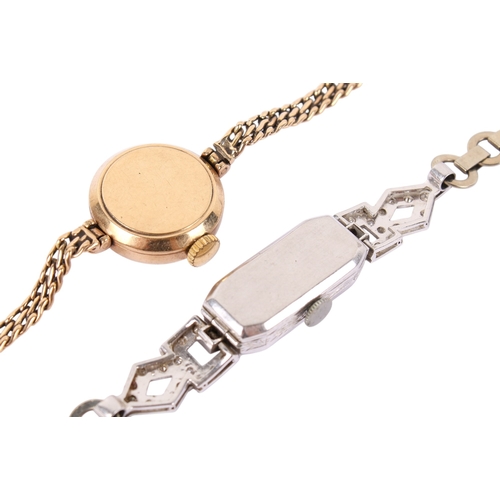 201 - A vintage 9ct gold lady's dress watch and a white metal example. The first Vertex Revue, with gilt m... 
