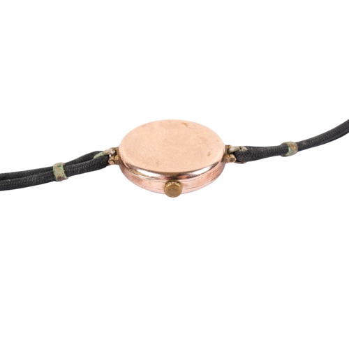 202 - A 9ct gold cased wristwatch. With black and red Arabic numerals to  the white face, hallmarks to fro... 