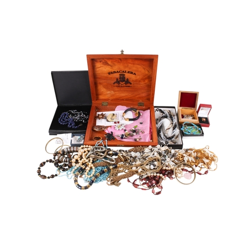 233 - A group of costume jewellery. Including necklaces, pendants, bracelets, various materials and colour... 