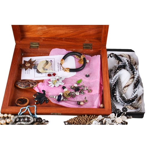 233 - A group of costume jewellery. Including necklaces, pendants, bracelets, various materials and colour... 