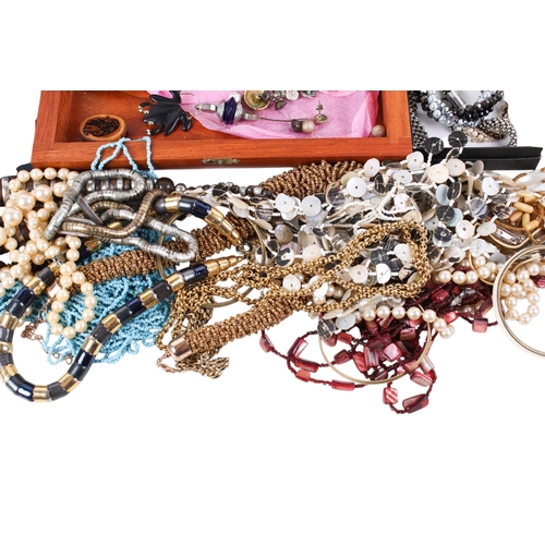 233 - A group of costume jewellery. Including necklaces, pendants, bracelets, various materials and colour... 