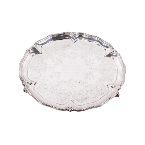 3 - A Victorian Goldsmiths Alliance silver salver. Of lobed form with bead rim, decorated with scrolls, ... 