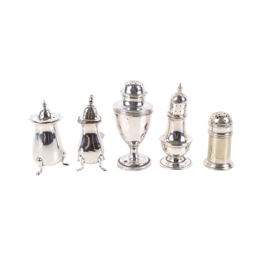 33 - Five silver and silverplated salt and pepper pots. Various designs and dates, one silver example wei... 