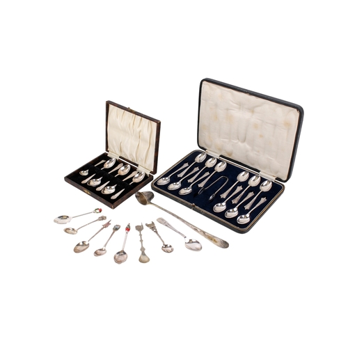 40 - A small group of silver and silverplated flatware. Including two boxed part sets of silverplated tea... 