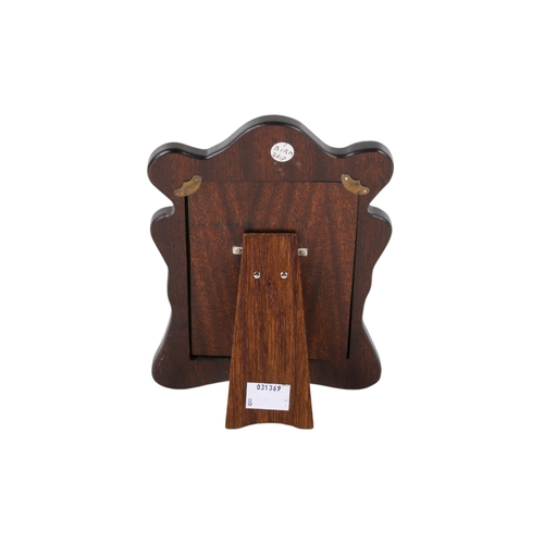 50 - An Art Nouveau style silver mirror. Of organic flowing form, four raised sections with transparent t... 