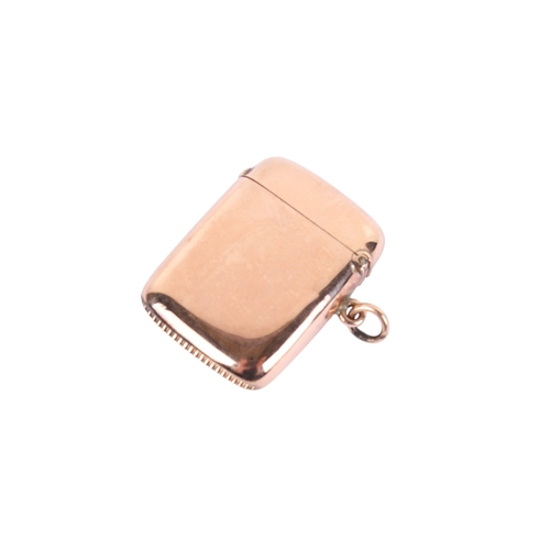 54 - A 9ct gold vintage vesta case. Undecorated except with a raised rectangle to one side, with hallmark... 