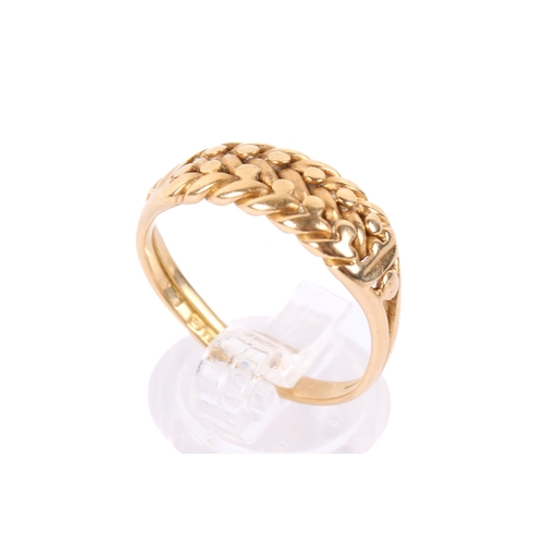 59 - An 18ct gold ring. With 'braided' centrepiece, hallmarked to shank. Misshapen size S, weight 5.5g.