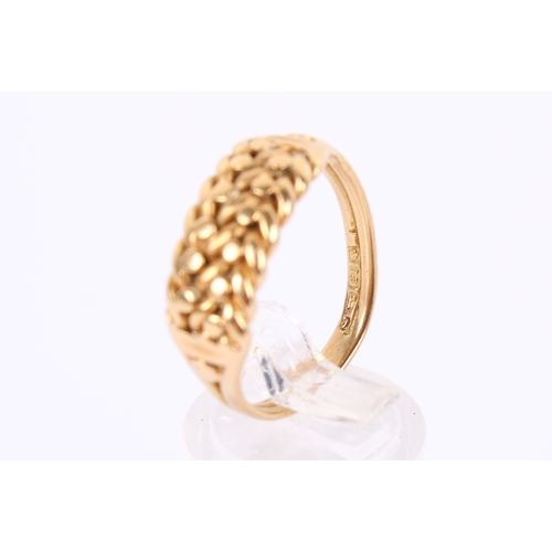 59 - An 18ct gold ring. With 'braided' centrepiece, hallmarked to shank. Misshapen size S, weight 5.5g.