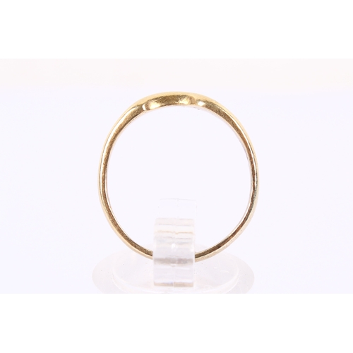 61 - An 18ct gold wedding band. Shaped to fit alongside a stone engagement ring, hallmarked 750, size O, ... 