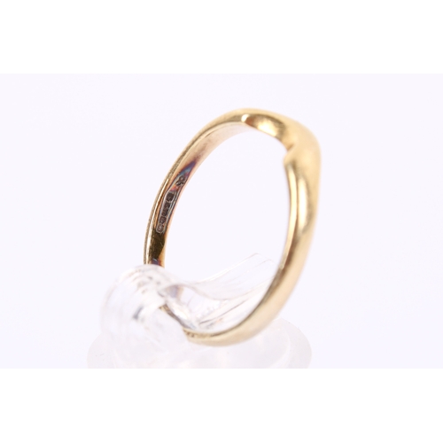 61 - An 18ct gold wedding band. Shaped to fit alongside a stone engagement ring, hallmarked 750, size O, ... 