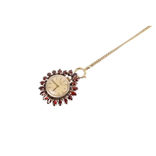 235 - A silver gilt fob watch with stone details. Ankra quartz, with gold face, goldplated mark 0.835 to t... 