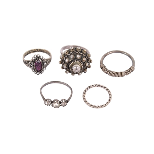 237 - Five white metal rings. Two set with stones, etc, gross weight 13.4g.
