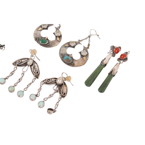 239 - Five pairs of floral design white metal and stone pendant earrings. Set with pearls, opal, jade, tur... 