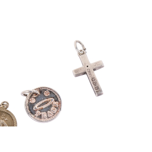 251 - Fifteen silver and white metal charms. Including a lady side saddle on a horse, stagecoach, teddy be... 