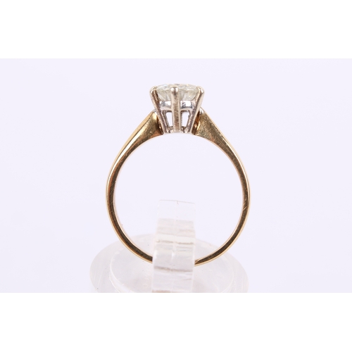 258 - A 9ct gold and moisannite ring. The stone of circa 7mm diameter, teh shank hallmarked, size J, gross... 