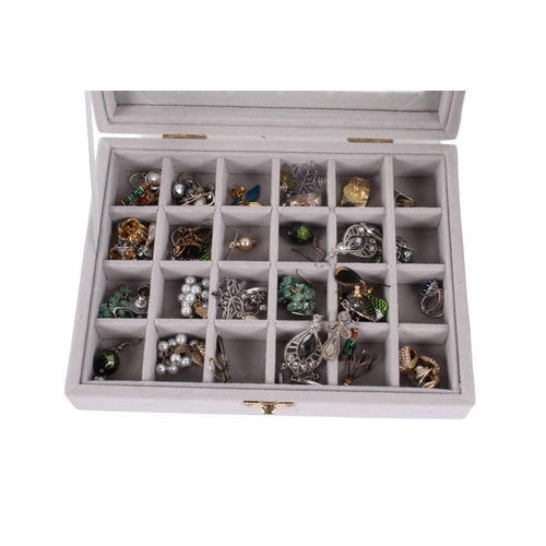 262 - A small group of costume jewellery. Including several pairs of assorted earrings, cuflinks, and a ye... 