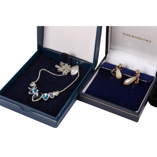 263 - Six pieces of designer costume jewellery. Including a Michael Kors bangle, pair of faux pearl earrin... 