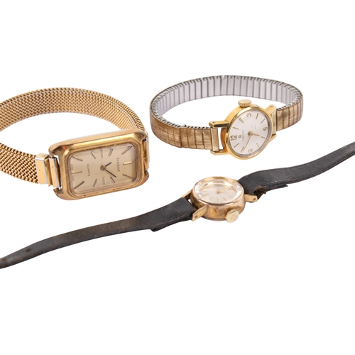 273 - Three lady's Tissot wristwatches. One gold plated with a black strap, two of yellow metal with elast... 