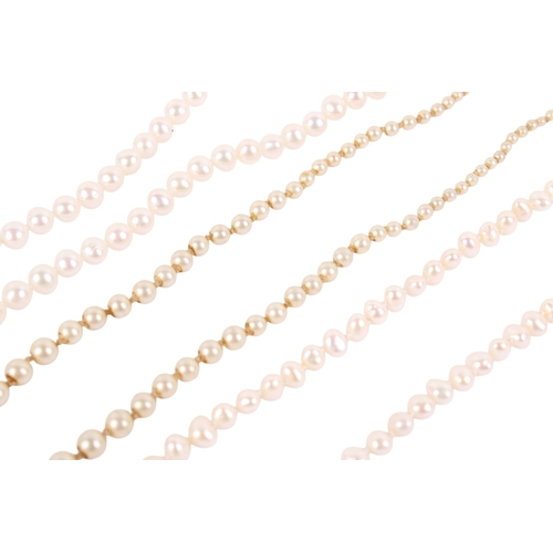 277 - Two pearl necklaces and one faux pearl example. One with a 9ct gold clasp, the other two with silver... 
