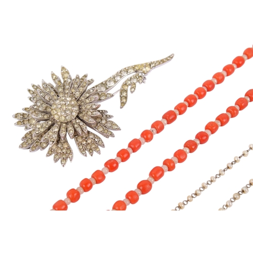 278 - A 1950s flower brooch, a bracelet and a necklace. The brooch en tremblent, in the style of Mitchel M... 