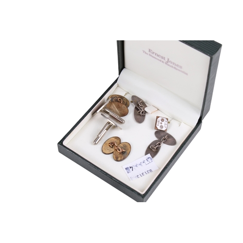 296 - A small group of silverplated items. Including tea and coffee pot, gold plated silver cufflinks, som... 