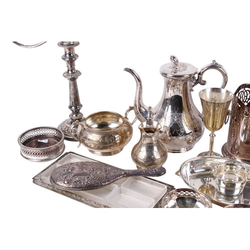 297 - A box of assorted silverplated table items. Including a coffee pot, candelabra, goblets, hair brush,... 