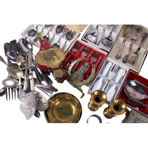 303 - A group of assorted silverplated flatware and brass. Including a few silver teaspoons, boxed sets of... 