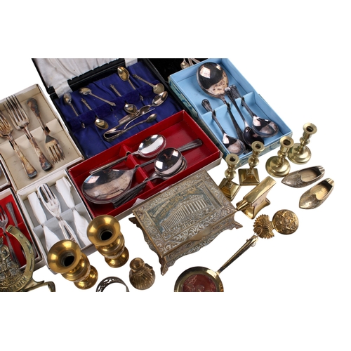 303 - A group of assorted silverplated flatware and brass. Including a few silver teaspoons, boxed sets of... 