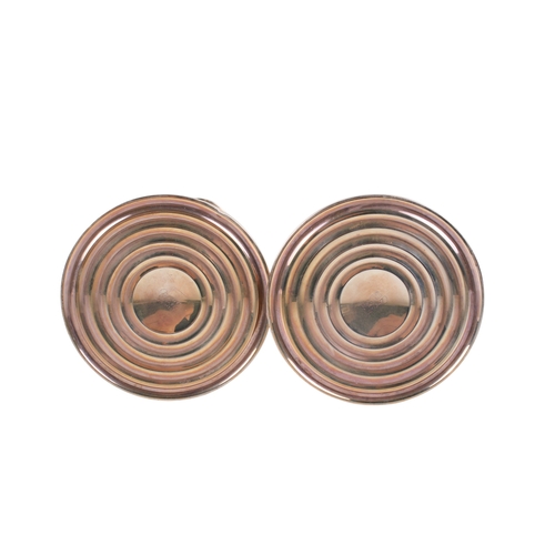 19 - A pair of Cartier silver candlesticks. Weighted, of classical form on a spread foot. Marked 'Cartier... 