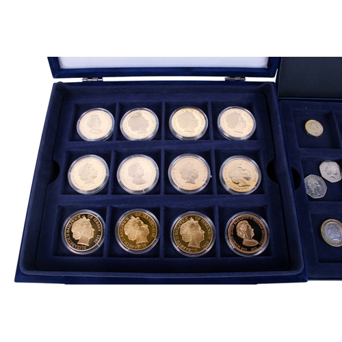 100 - A boxed collection of 2013 coins. Consisting of assorted seventeen world wide gold plated and enamel... 