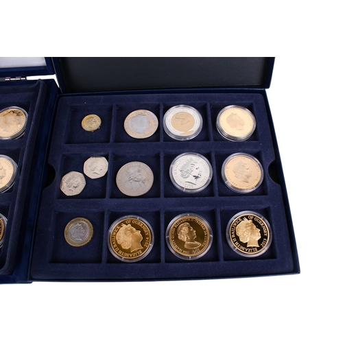 100 - A boxed collection of 2013 coins. Consisting of assorted seventeen world wide gold plated and enamel... 