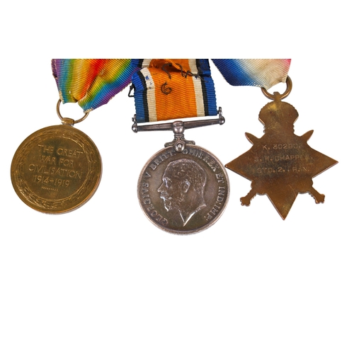 17 - A trio of WWI medals on ribbons in a Princess Mary Christmas 1914 gift tin. Comprising the 1914 Star... 
