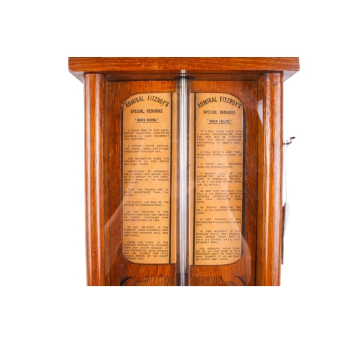 215A - A 19th century Royal Polytechnic 'Admiral Fitzroy' oak cased barometer by Joseph Davis & Co. The cas... 