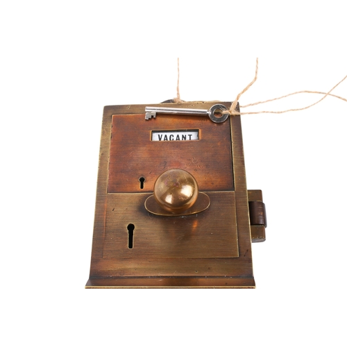 235 - A Lockerbie & Wilkinson Ltd Tipton penny slot brass toilet cubicle lock. Having a Vacant/Engaged sli... 