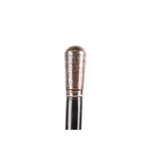 294A - Two white metal mounted and ebonized walking sticks and a similar swagger stick. The swagger stick h... 