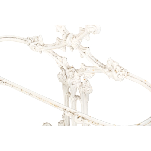 442 - A Victorian Coalbrookdale cast iron umbrella and stick stand. Painted white with scrolling decoratio... 