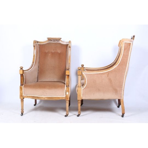 409 - A French style Edwardian mahogany salon suite. Comprising a two seater settee and two armchairs, the... 