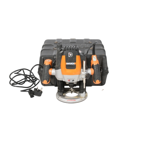 An electric Worx Plunge Router. With various attachments, within heavy ...