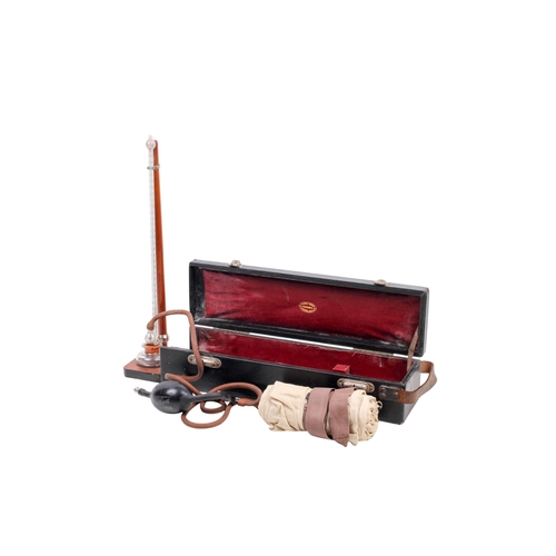 148 - A Down Bros London portable mercury blood pressure gauge. The gauge folding upwards from the fitted ... 