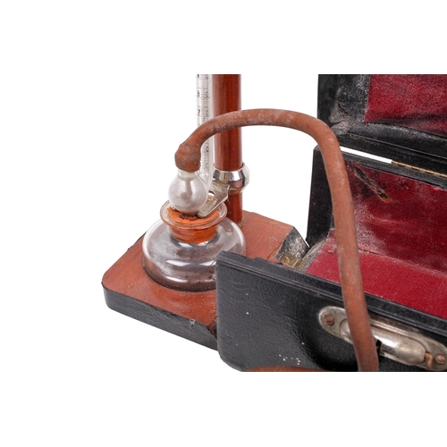 148 - A Down Bros London portable mercury blood pressure gauge. The gauge folding upwards from the fitted ... 