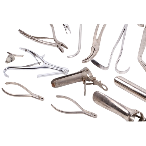 152 - A collection of medical and surgical tools. To include a syringe, a Trocar, and clamps with Broad Ar... 