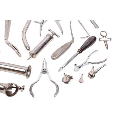 152 - A collection of medical and surgical tools. To include a syringe, a Trocar, and clamps with Broad Ar... 