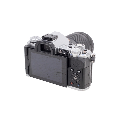 72 - An Olympus OM-D E-M5II Mirrorless Digital camera. Powers on, shutter working. With a Lumix G 45-175m... 