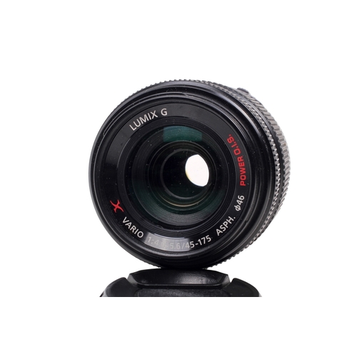 72 - An Olympus OM-D E-M5II Mirrorless Digital camera. Powers on, shutter working. With a Lumix G 45-175m... 