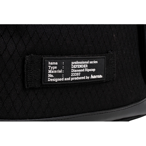 76 - A large Hama Defender 220 camera backpack bag. Appears unused with original tags attached.